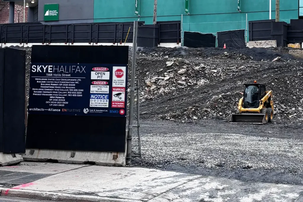 Blasting and excavation preparation at Skye Halifax by United Gulf Developments in Halifax, Nova Scotia, including drilling and tie-back anchor installation